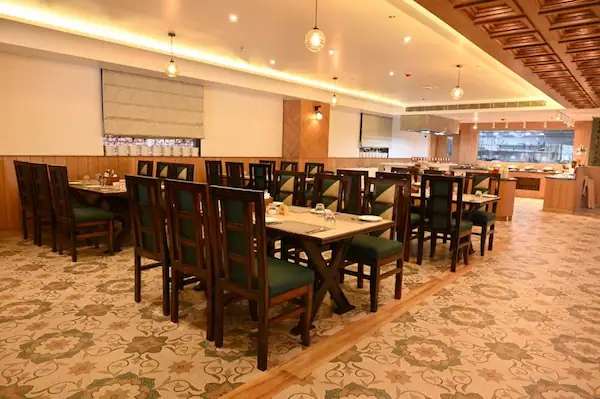 Hotel In Ayodhya Up features Cafe Vindhyas, an inviting dining spot.