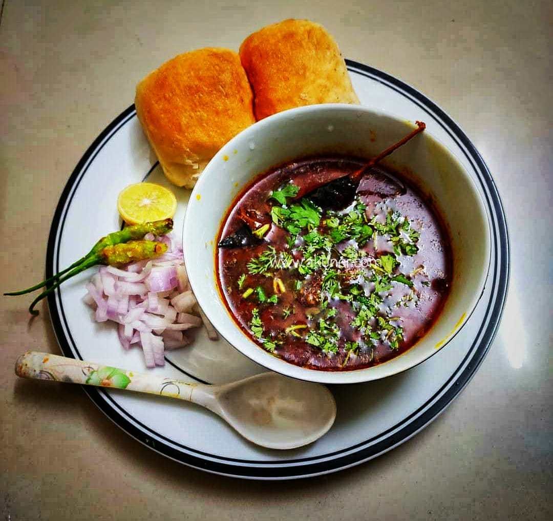 Spicy Nashik misal pav served with pav