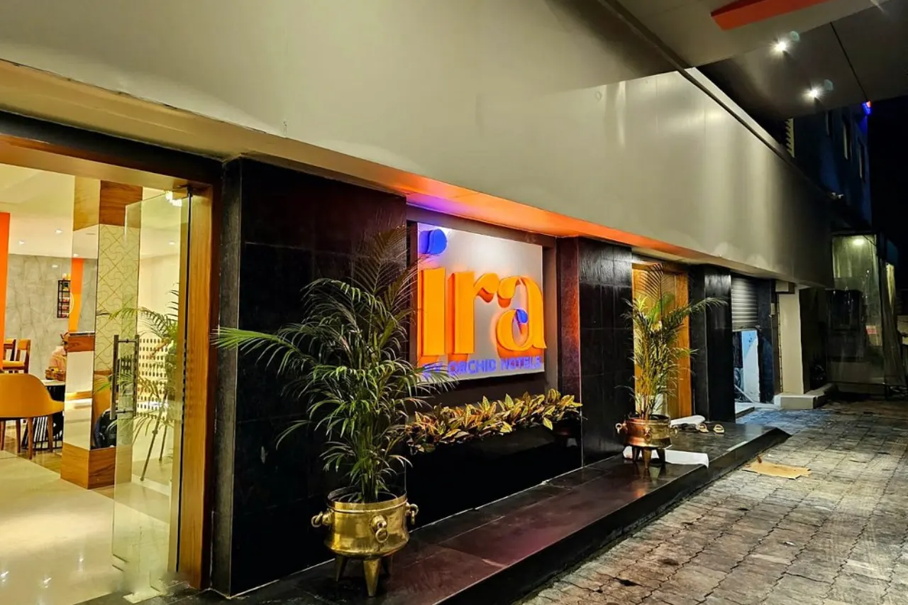 Elegant lobby at IRA Hotel Nashik offering a warm welcome to guests